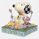 Jim Shore Peanuts Snoopy in bed of Flowers Figurine