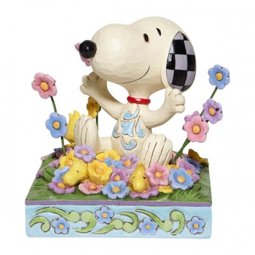 Jim Shore Peanuts Snoopy in bed of Flowers Figurine