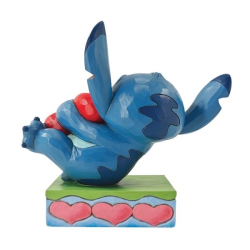 Disney Traditions Stitch Hugging a Heart Figurine