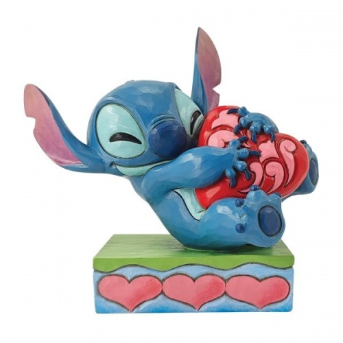 Disney Traditions Stitch Hugging a Heart Figurine