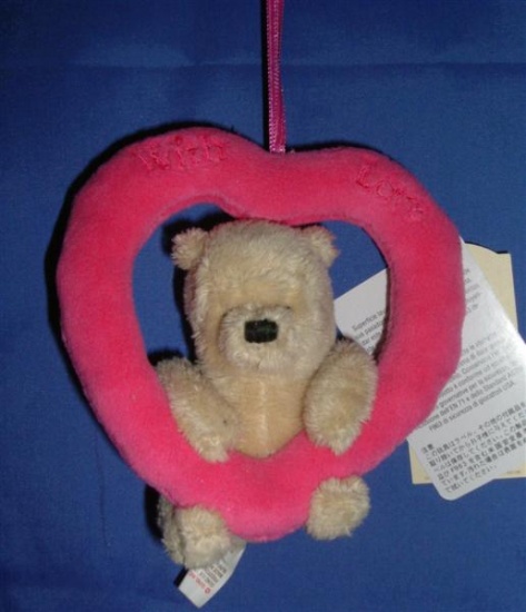 Winnie the Pooh - Holding a Heart on a Ribbon - Gund